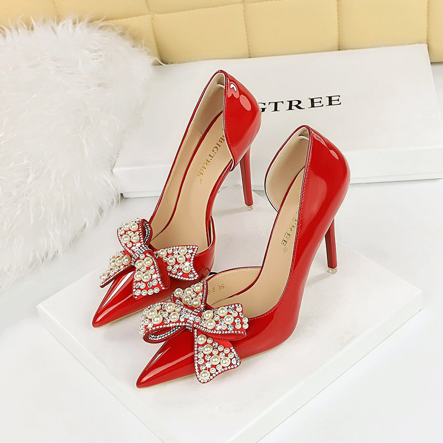 Pointed side hollow pearl rhinestone bow women's shoes with super high heels